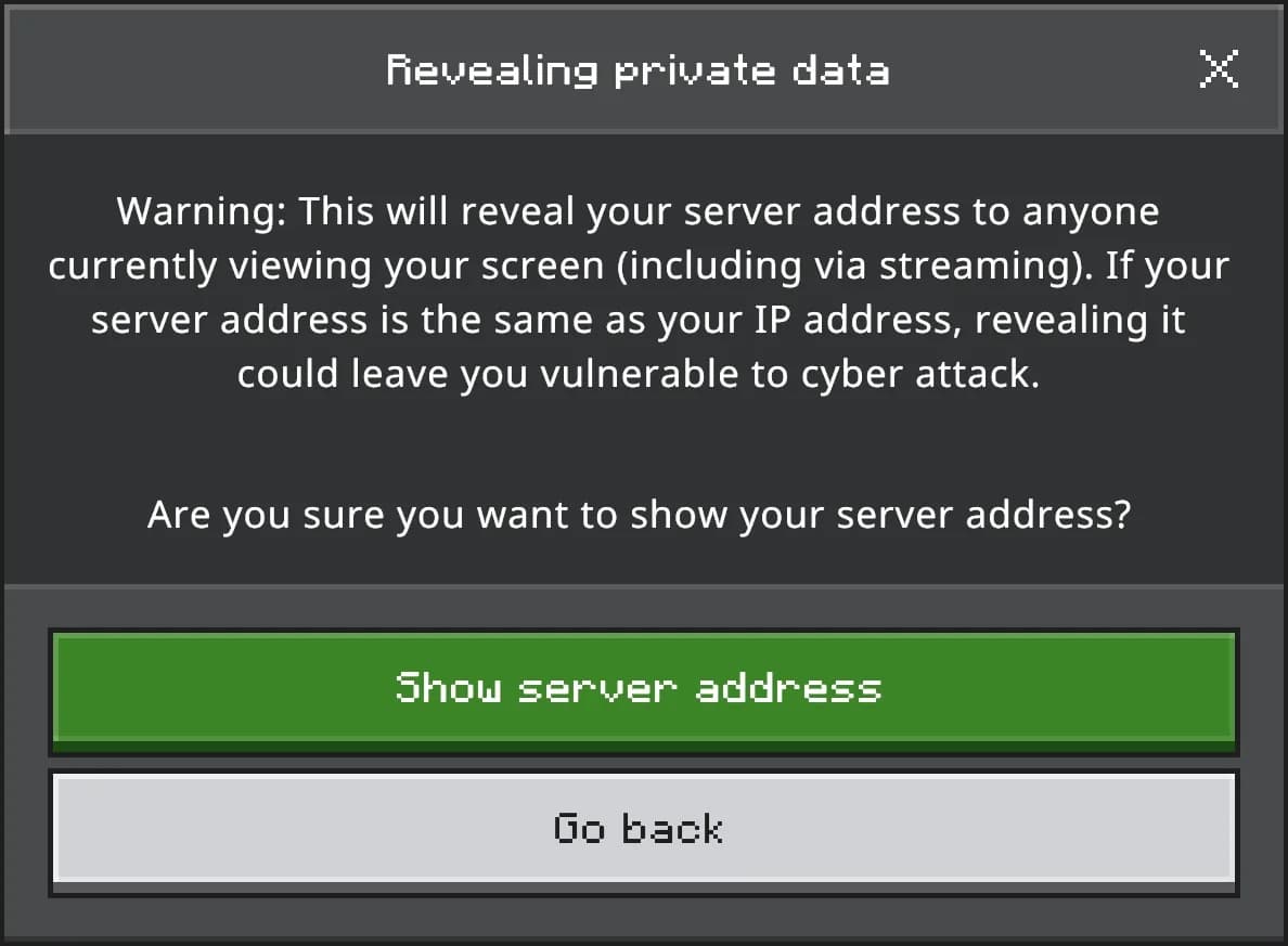 A Bedrock Edition pop-up titled Revealing private data, warning that showing the server address reveals your IP