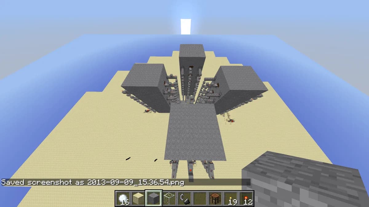 A tall mob farm tower in a desert, the kind of build that fills the server with entities