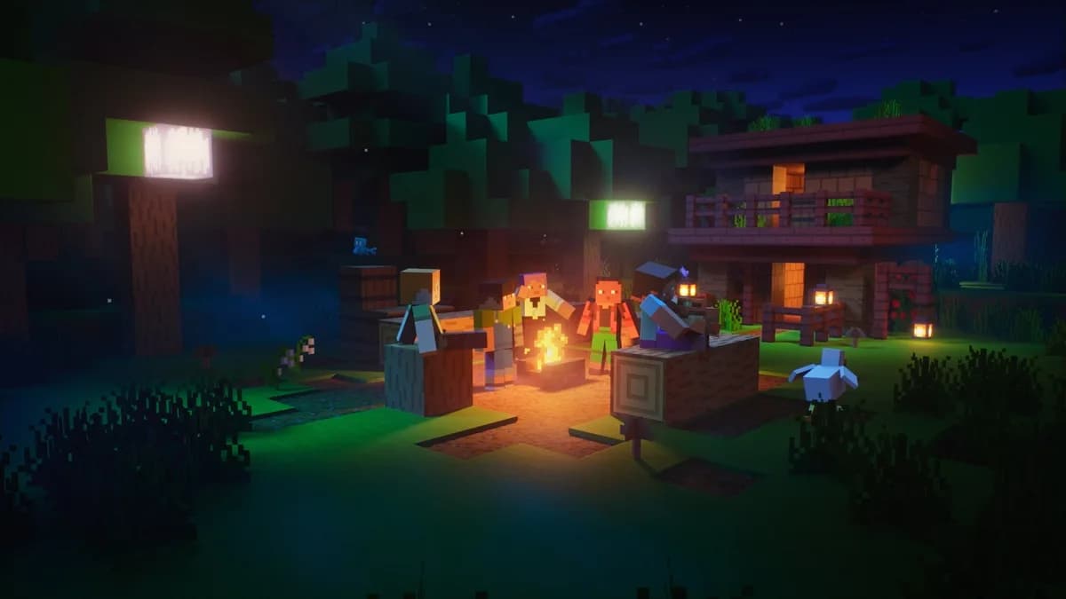 A group of players sitting around a campfire at night outside a wooden house